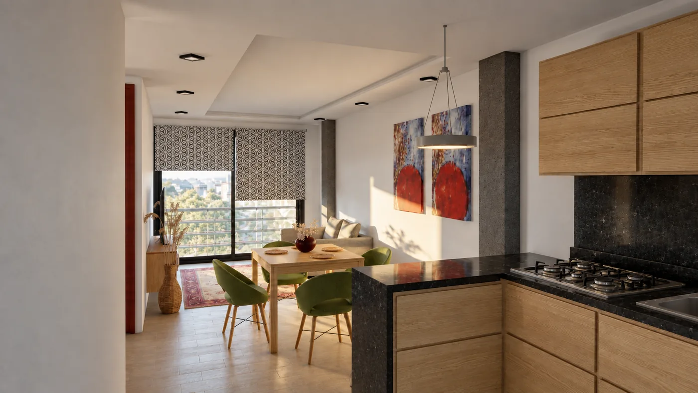 Cocina con mesón oscuro abierta al comedor, la sala y el balcón con luz natural